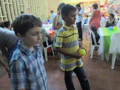 Josiah bowling with Natalie's host brother.