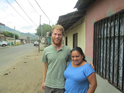 Ben with his Jinotega, host mom, outside their home