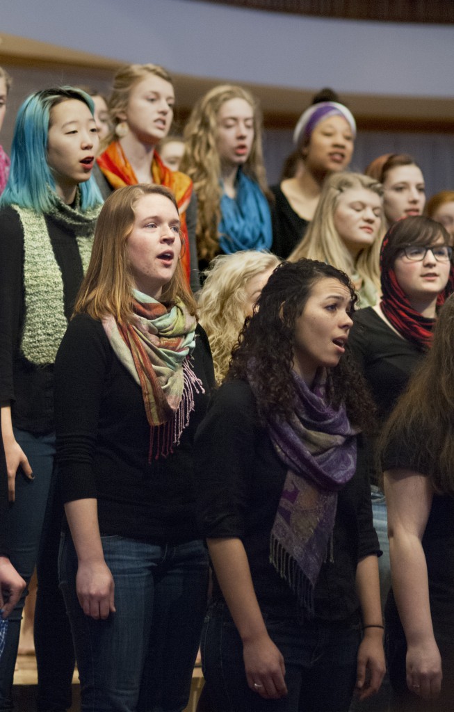 The Goshen College Women’s World Music Choir  toured in Pennsylvania during their Spring Break. During performances, members wear vibrantly colored scarves and go barefoot as a way to feel connected to the earth and to women around the globe. (Photo by Brian Yoder Schlabach)