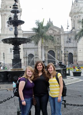 Aimee, Maria and Gina pause for a photo in front of the Cathedral of Lima.