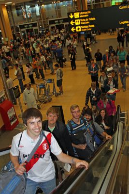 Jake, Dean, Jackson, Jonathan, April and other students head toward their departure gate at the Lima airport.
