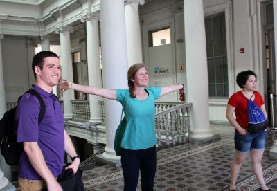 Brian, Emma and Edith catch a breeze in the train station.