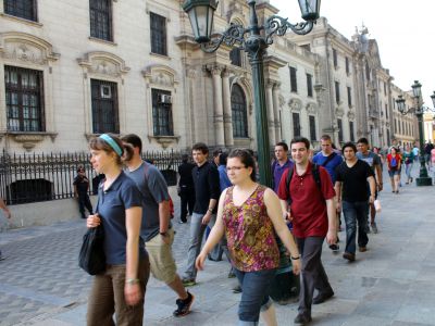 Students stride past the Government Palace.
