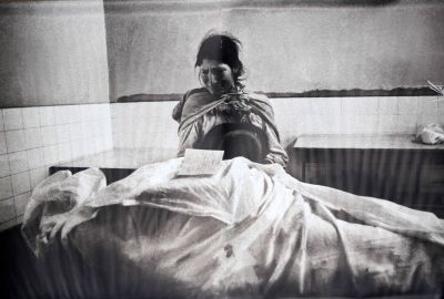 A woman mourns a victim of the Shining Path war.