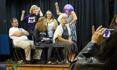 Students present a play during the despedida, using public transportation in this photo.