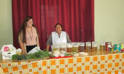 Alicia poses with Frances before starting her herb presentation. Frances served as translator.