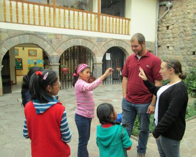 Bryan and Danielle interact with students after lunch at San Francisco school.