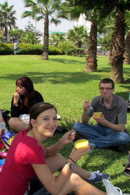 Morgan and Peter dig into their picnic lunch of causa rellena con pollo.