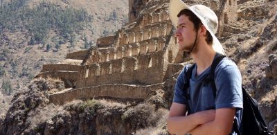 Tim with the Pinkuylluna ruins behind him.