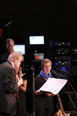 Sadie Gustafson-Zook, a junior from Goshen, sings a duet with Garrison Keillor.