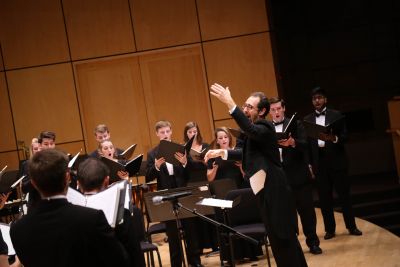 Dr. Scott Hochstetler directs the Goshen College Chamber Choir during the Homecoming Music Gala on Oct. 8, 2016. 